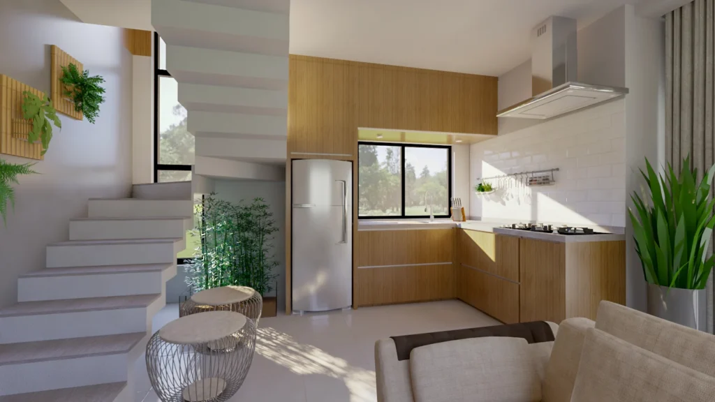 Cozinha vista da escada, com bancada em L, coifa e a escada de concreto em primeiro plano